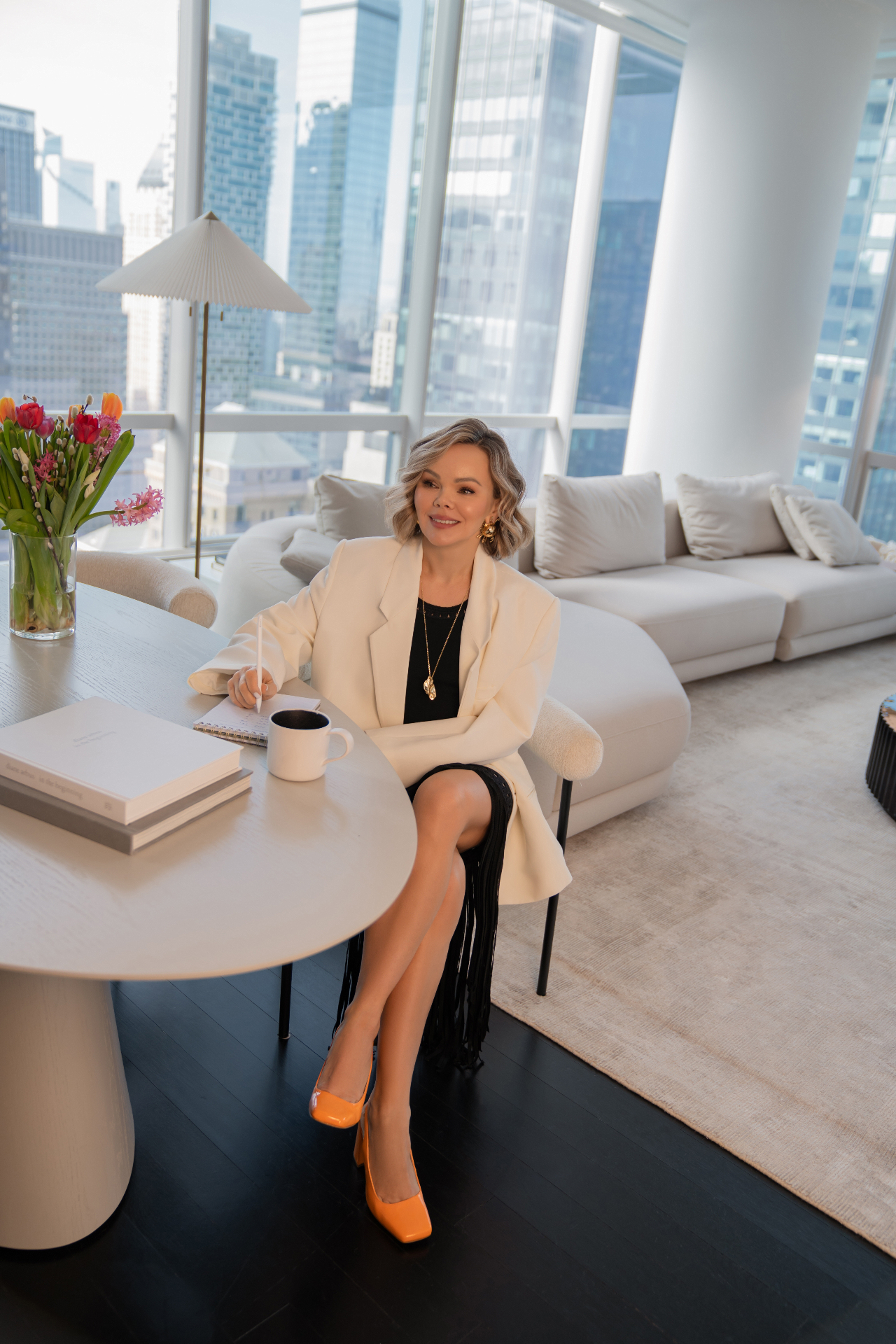 Nataly Pike in her modern office with city view